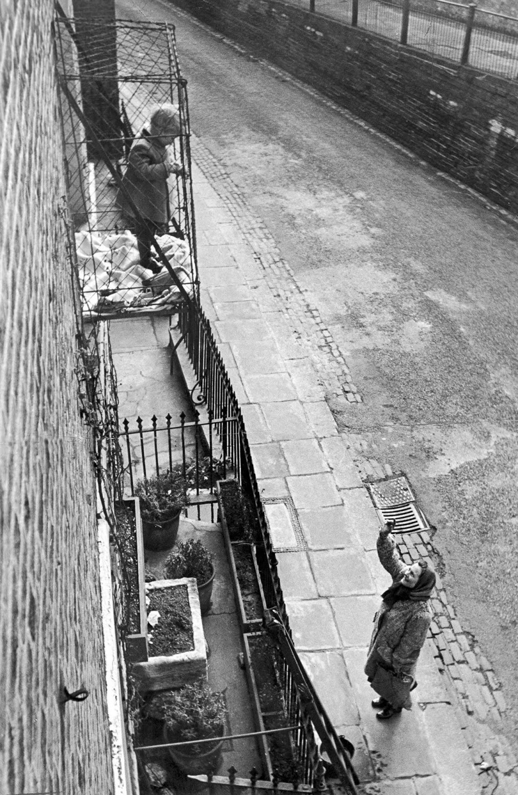 A baby in a cage in 1948.