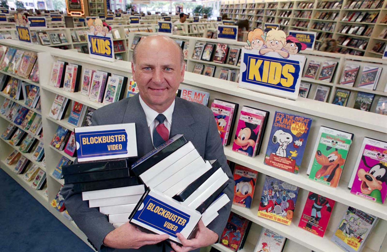 H. Wayne Huizenga, chairman of Blockbuster Entertainment Corporation. The original caption states he “wants to build a nationwide chain of video cassette rental stores. During the first quarter of this year, Blockbuster opened or acquired 84 stores and, as of June 30, they operated 235 stores, up from 19 at the end of 1986.”