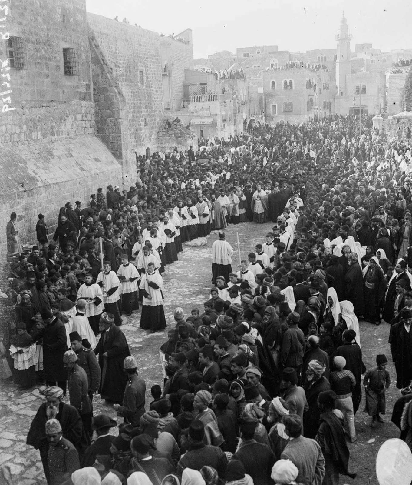 A Catholic bishop arrives for Christmas services. 1915.