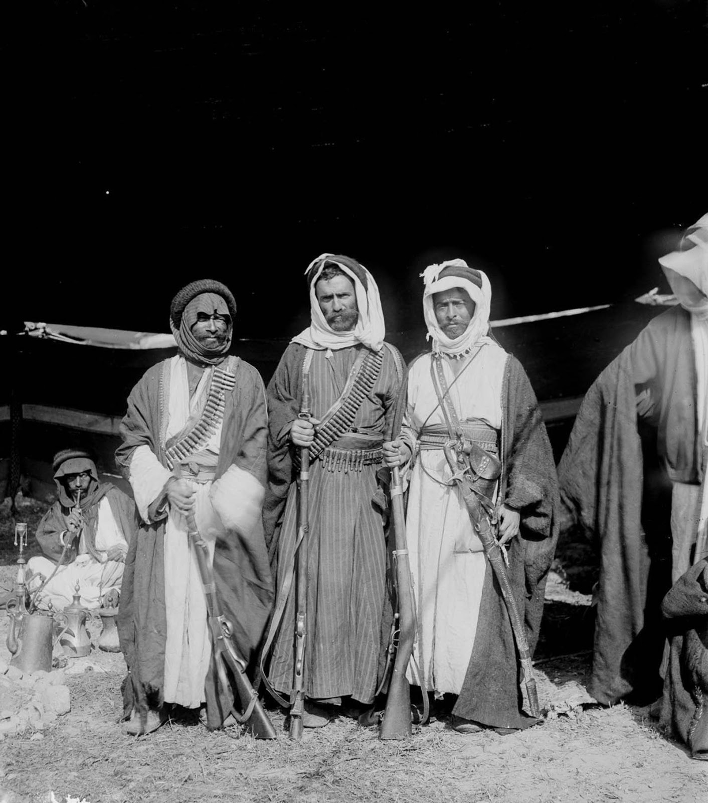 Armed Bedouin men.