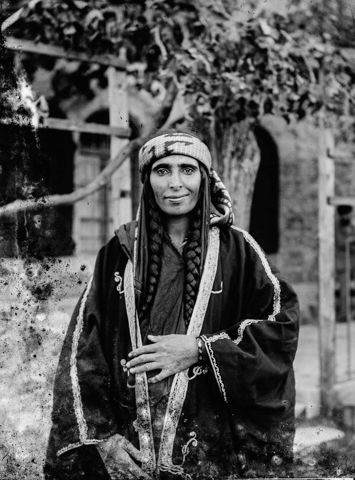 Arab Christian Bedouin woman from the settled town of Kerak, Jordan, who probably was the wife of a sheikh. Braids were predominantly worn by Arab Christian Bedouin women of the tribes of Jordan.