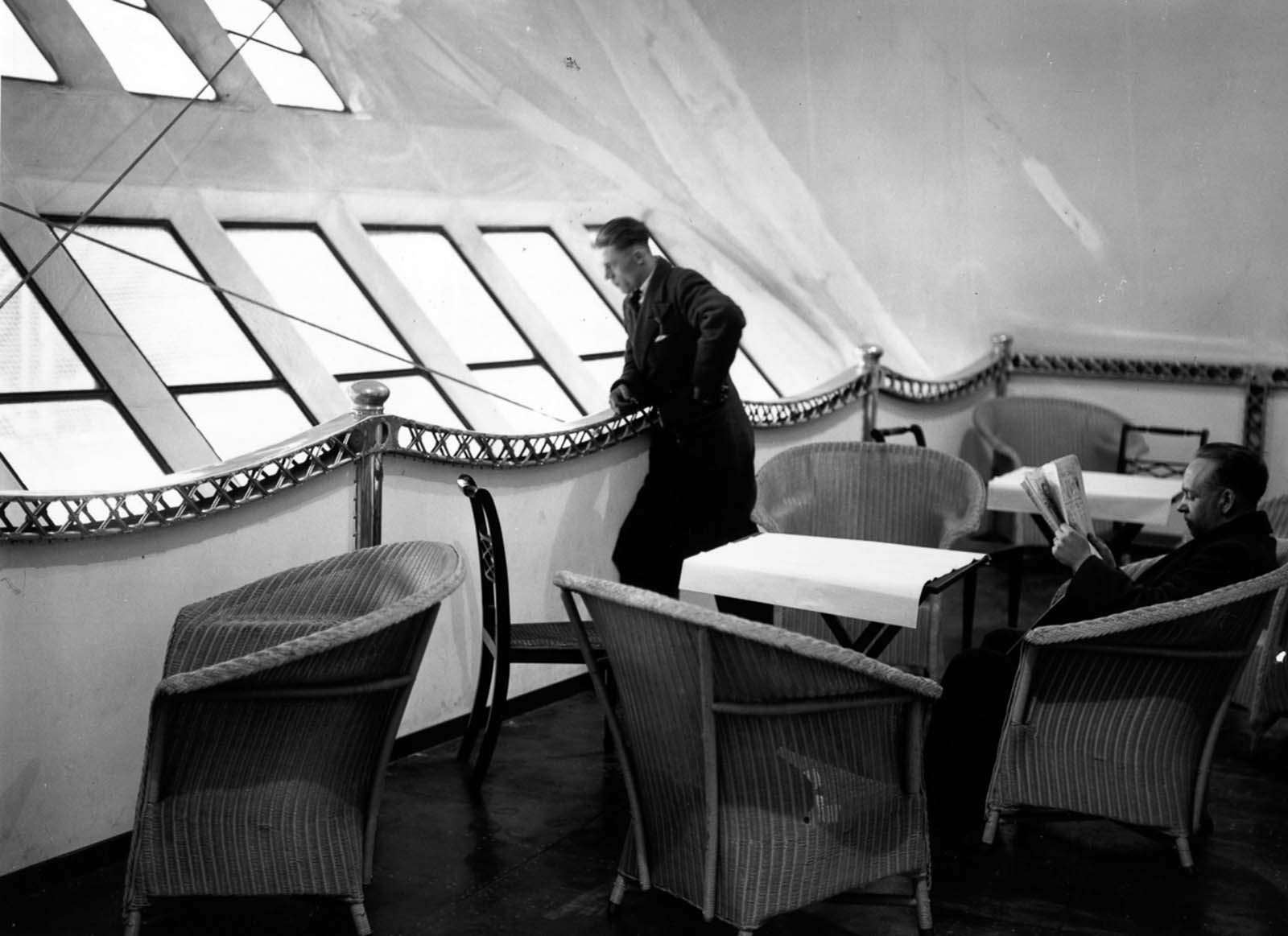 A passenger looking outside the R-100 panoramic windows.