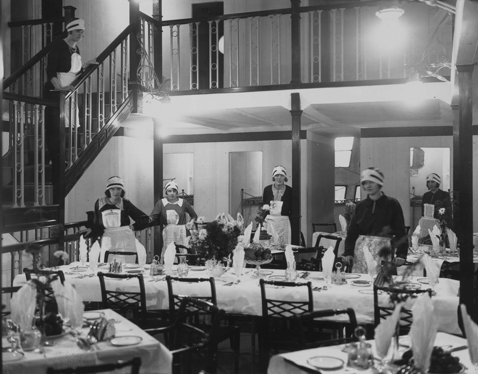 The lounge is rearranged as a dining room for meals. 1929.