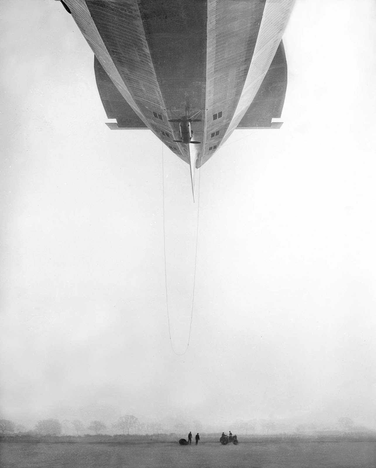 The R-100 leaves her mooring on her maiden voyage.