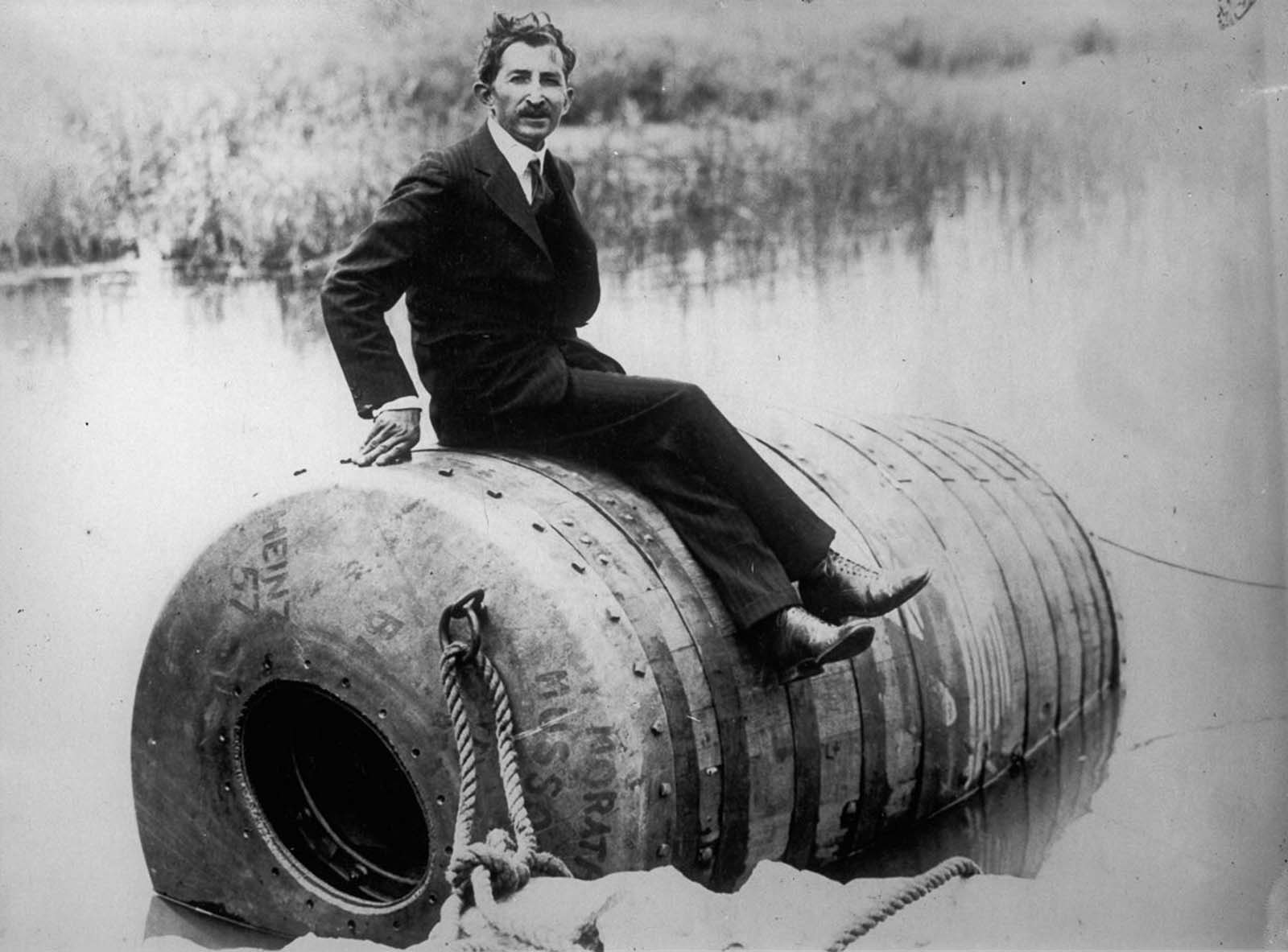 George Stathakis poses on his barrel before taking the plunge. 1930.