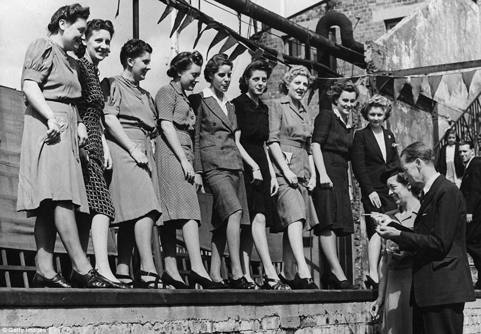 The ankle judging competition at Selfridges department store's annual sports meeting on the roof of the shop's building in London's Oxford Street in 1943.