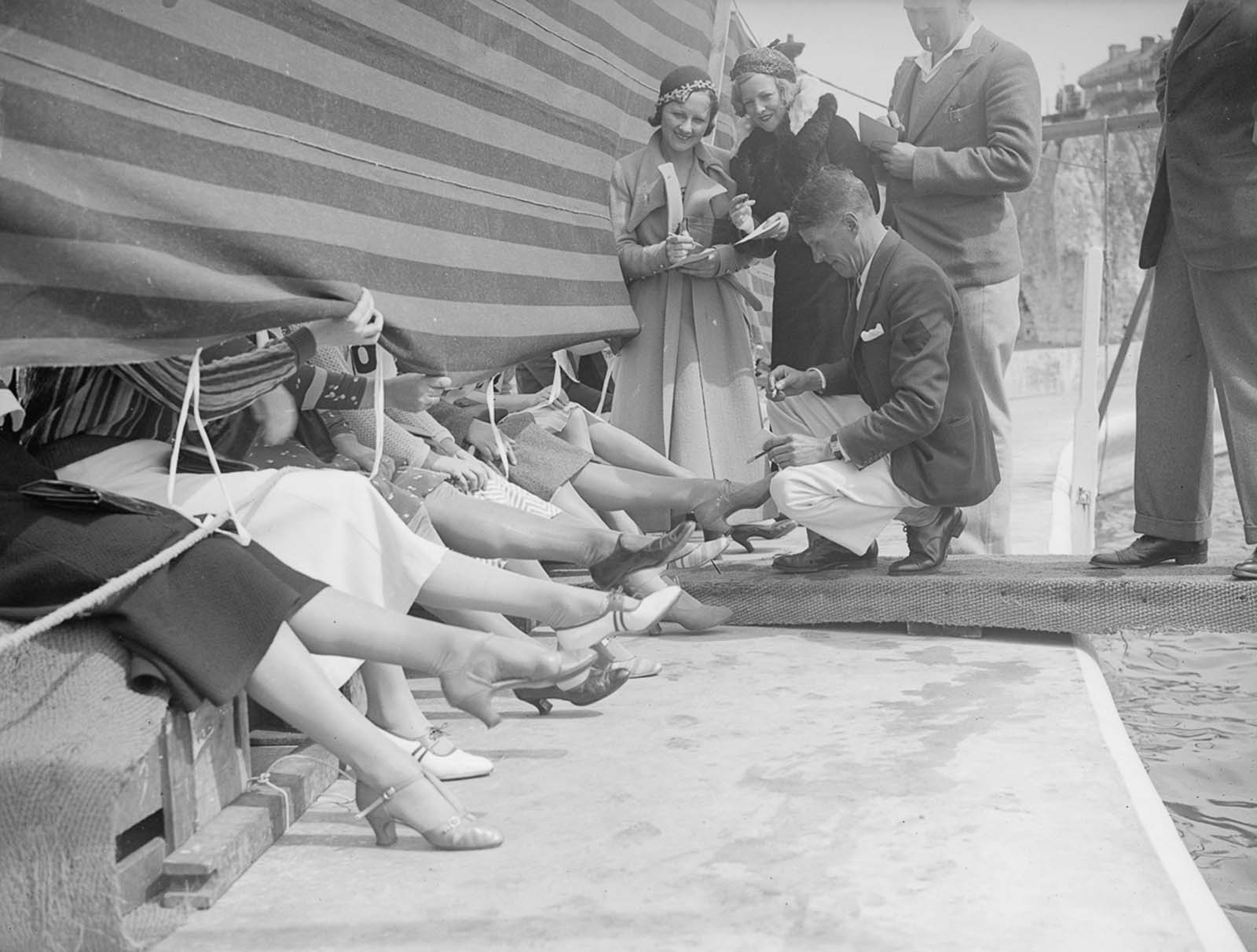 Judges and competitors at a 'prettiest ankle' contest, Cliftonville, Kent in 1933.