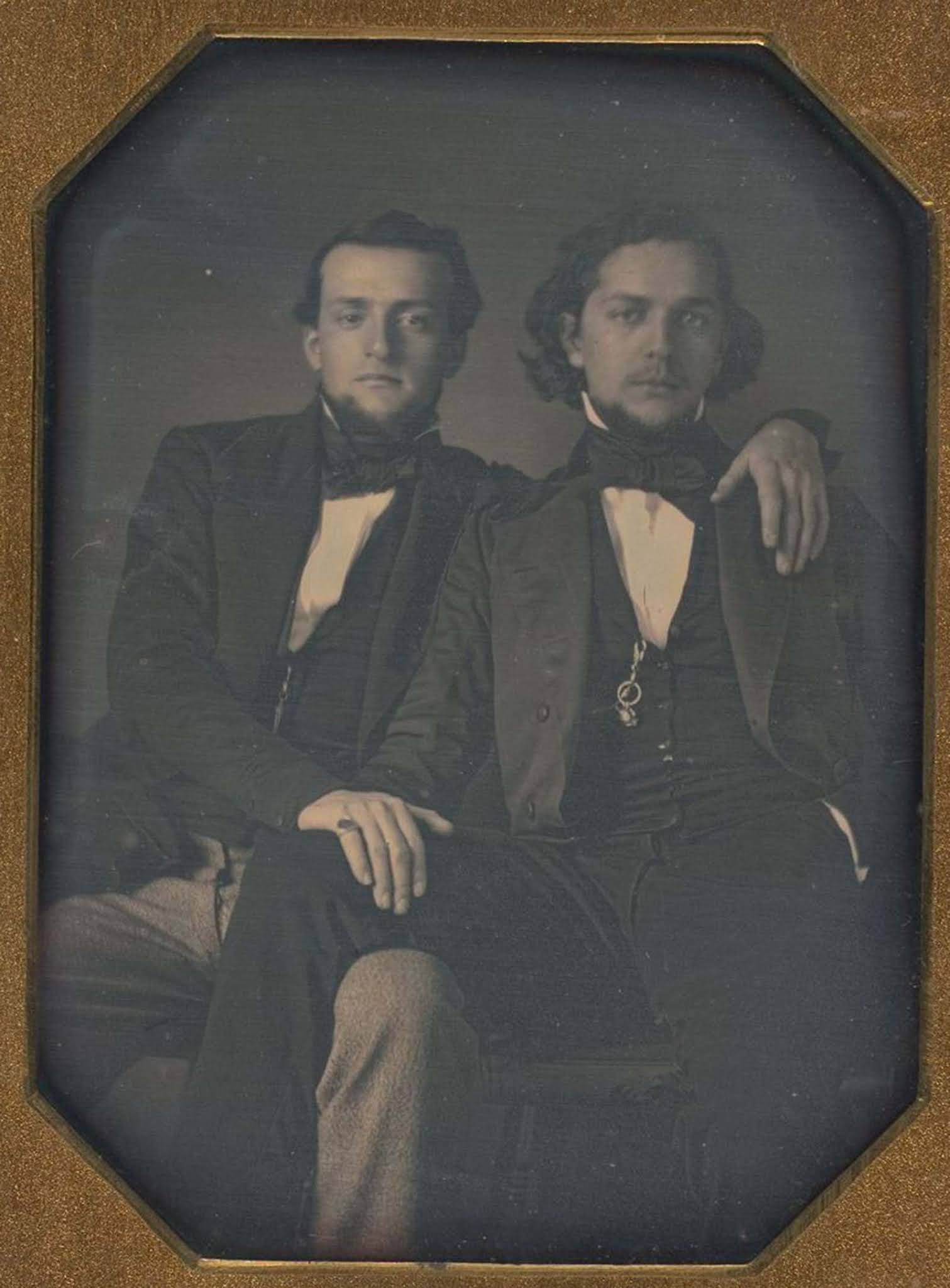 victorian men intimate embracing