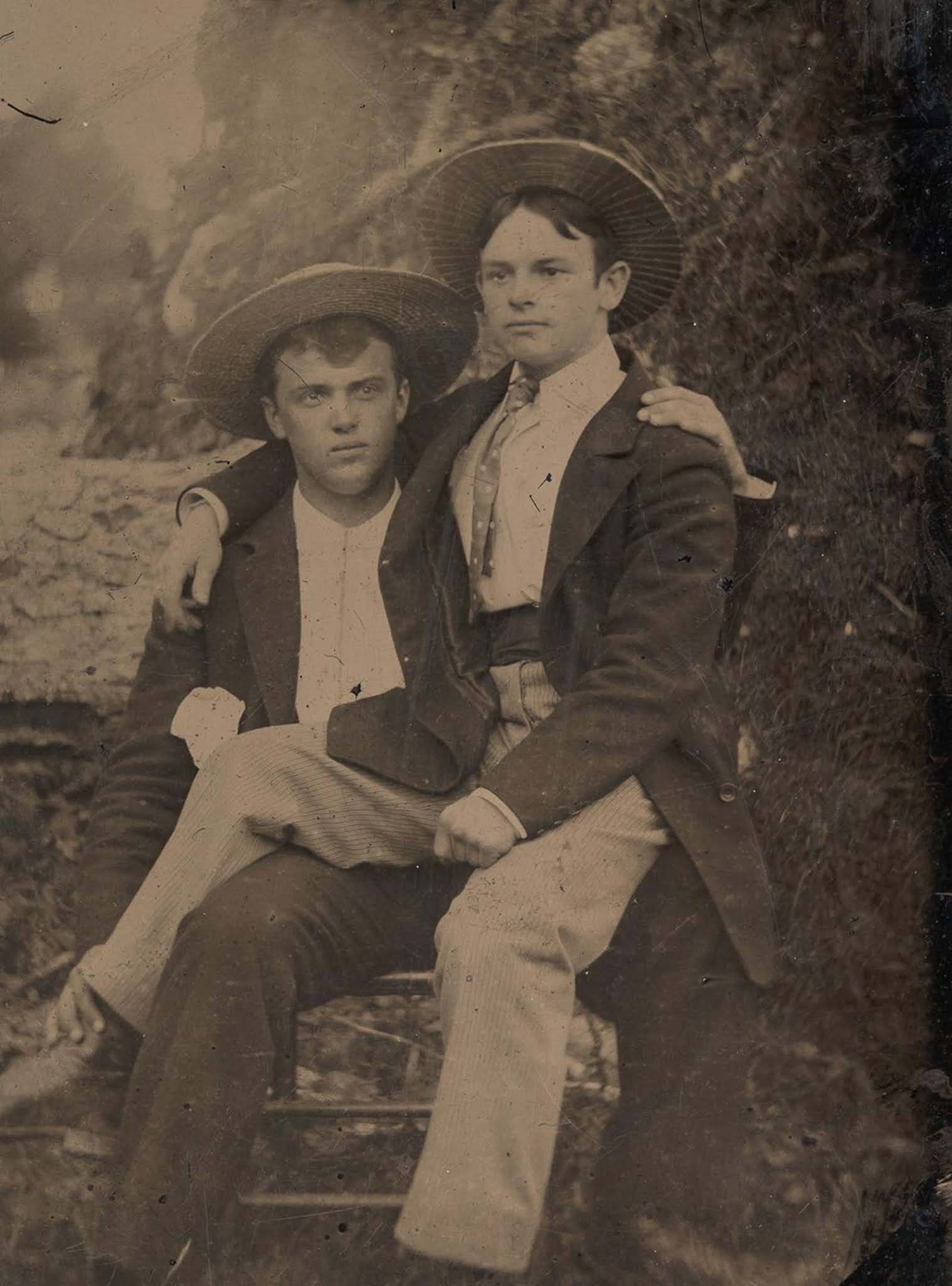victorian men intimate embracing