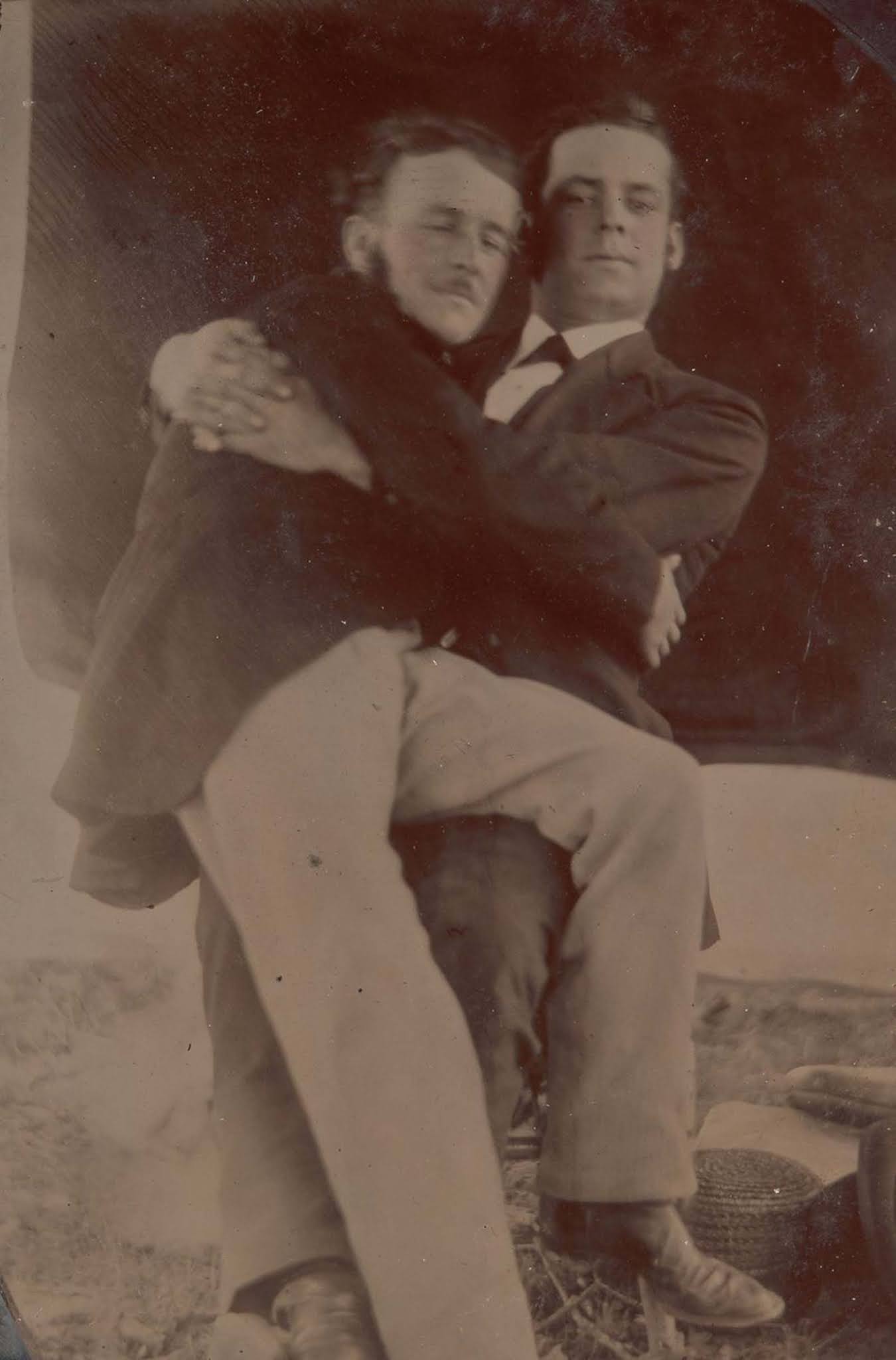 victorian men intimate embracing