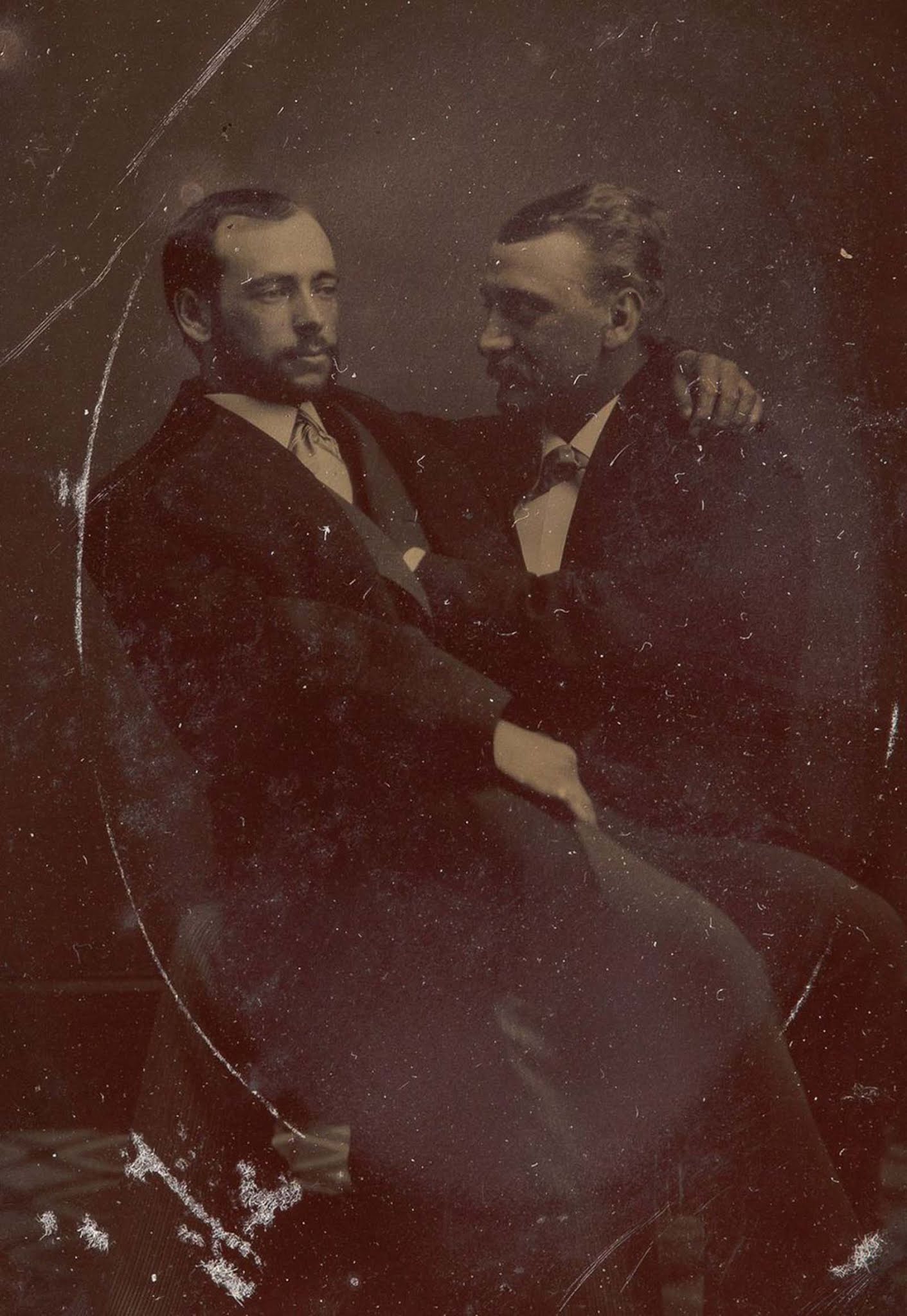 victorian men intimate embracing