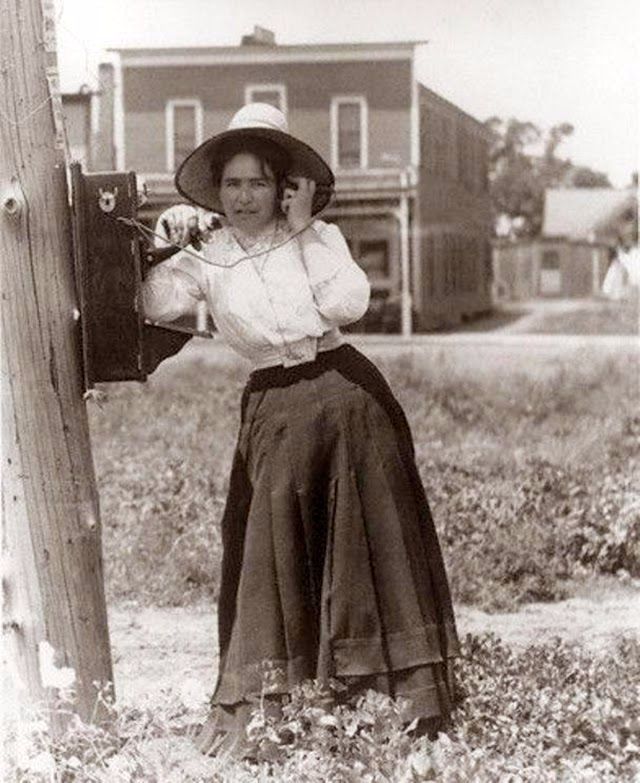 Old Photos of People Talking on Telephones