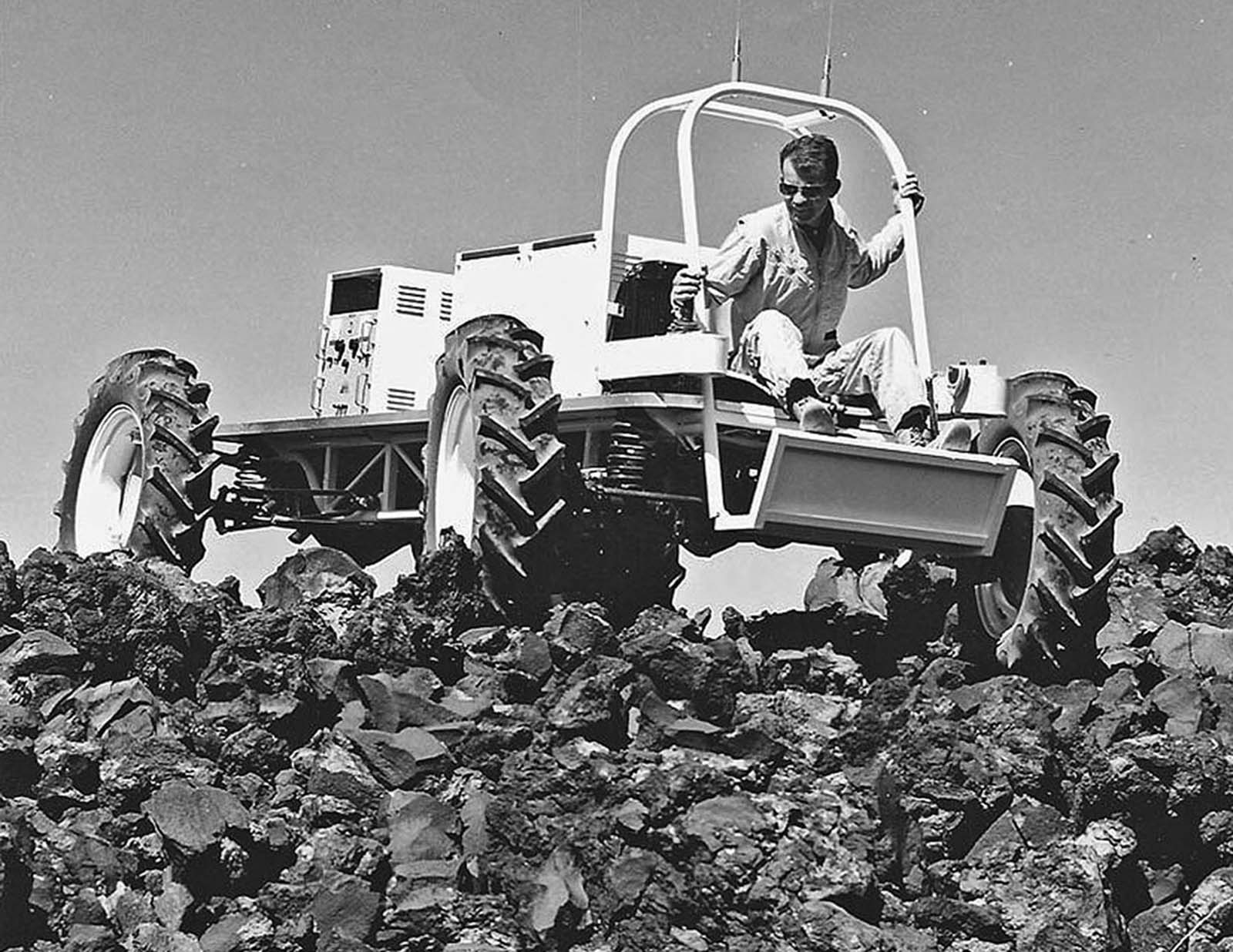 The hand-constructed Explorer vehicle, made by the astrogeology branch of USGS, is field tested in June 1967 on an extremely blocky lava flow just west of Hank's Trading Post, near Flagstaff, Arizona.