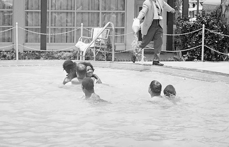 Motel manager pouring acid in the water when black people swam in his pool